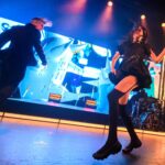 Pop/Dance Music Star Injured, Performs Concert in Wheelchair and on Crutches