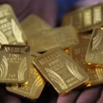 Gold hits another record, silver soars