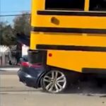 WATCH: Sports car slams into school bus in Florida